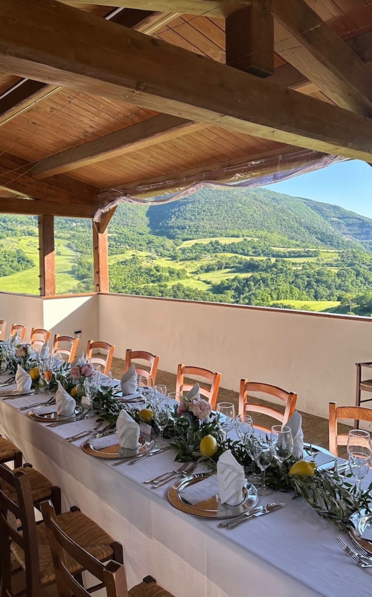 Dinner table overlooking the Umbrian hills at Villamena